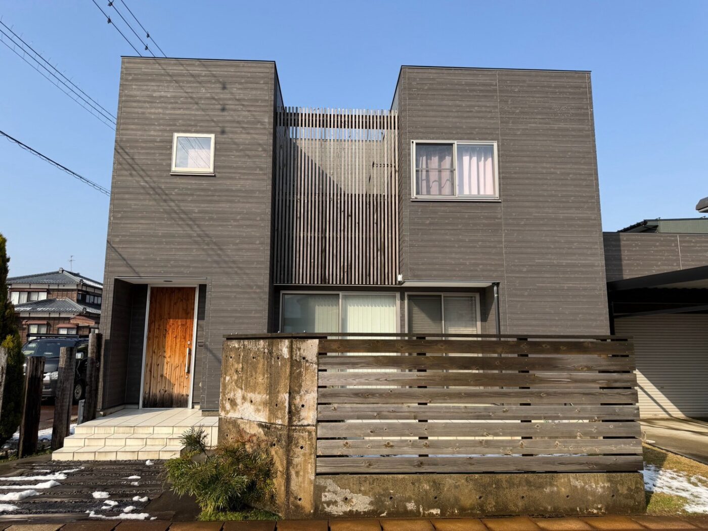 阿賀野市 外壁カバーとサンルーム改修 施工後の外観